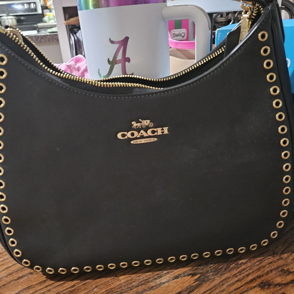Coach Black and Gold Hobo Bag with Eyelet Detailing